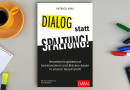 Fachbuch „Dialog statt Spaltung!“ auf einem Schreibtisch